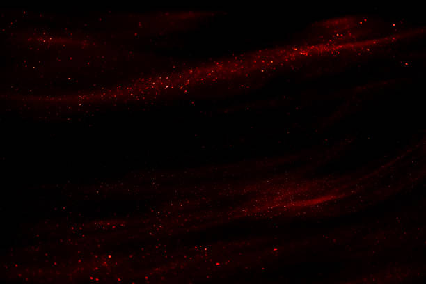 istock abstract red speed camera motion background over glowing lights with sparkles, stars. 2148937235