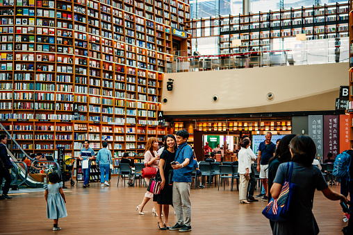 People spending time in Starfield Library in Starfield COEX Mall in Seoul, South Korea.