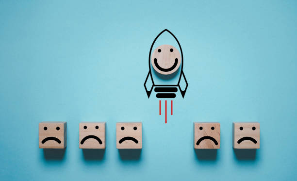 istock Smile face icon inside rocket missile rising from sad face icon for customer excellent experience evaluation feedback and survey concept. 2148938677