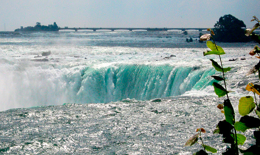 At the edge of Niagara Falls, Horseshoe Falls close-up view. Ontario, Canada.