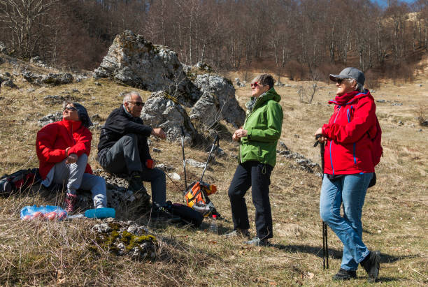 istock Elderly people walking on the mountain 2148939424