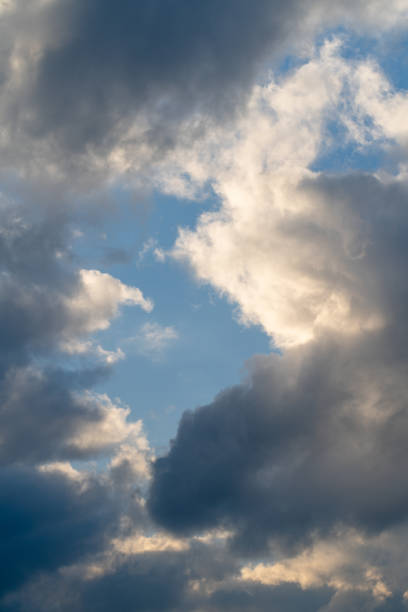 istock After the rain. Majestic clouds in the dramatic sky at sunset 2148940064