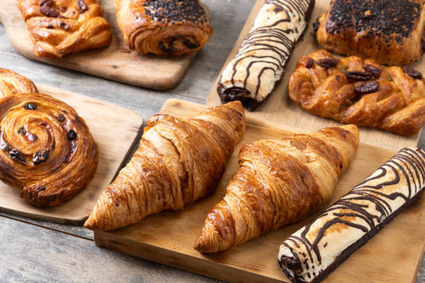 istock Set of bakery pastries on wooden table 2148941946