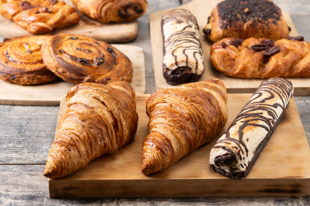 istock Set of bakery pastries on wooden table 2148942114