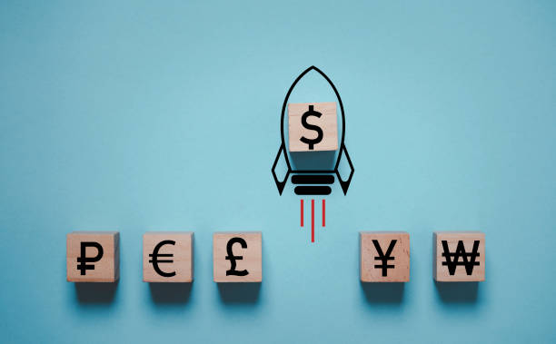 istock USD dollar sign with missile rocket move rising from other currency include ruble euro pound sterling yuan and won for FED increasing percentage interest to reduce inflation concept. 2148942390