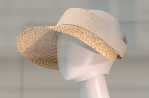 istock Women's hat on a mannequin in a shop window 2148945449
