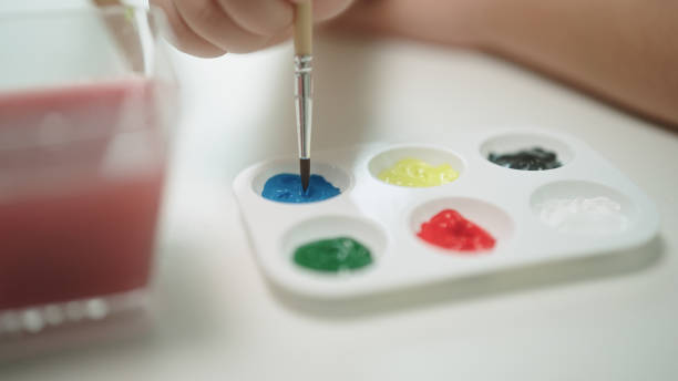 istock A girl enjoy painting. 2148945805