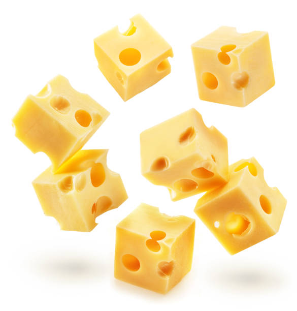 istock Emmental or Maasdam cheese cubes falling down on white background. 2148945908