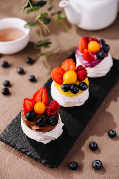istock Elegant fruit pavlovas on slate tray 2148946014