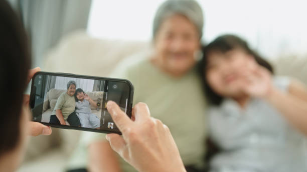 istock Taking a photo elderly with grandkid. 2148946345