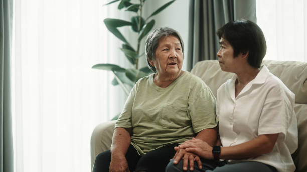 istock Elderly relax talking with her daughter. 2148946567
