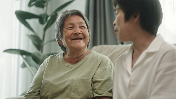 istock Elderly relax talking with her daughter. 2148946583