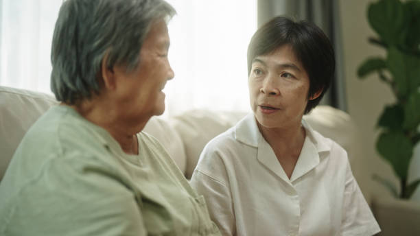 istock Elderly relax talking with her daughter. 2148946588