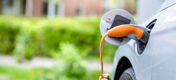 istock Hybrid car at the charging station 2148946627