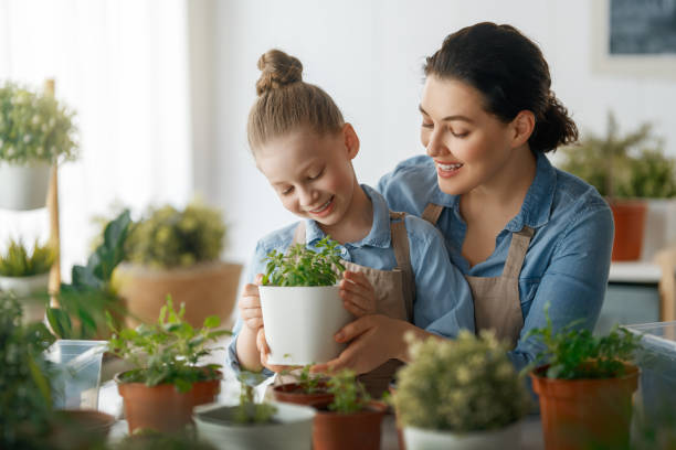 istock Family caring for plants 2148947630