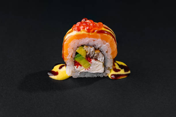 istock Exquisite sushi roll with salmon and caviar 2148948072