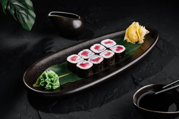 istock Elegant tuna sushi roll presentation on dark background 2148948106