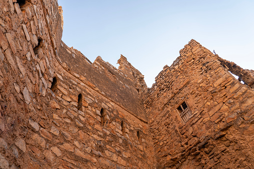 Ruined buildings in desert village in Wadi Bani Awf - Al Hamra,Oman