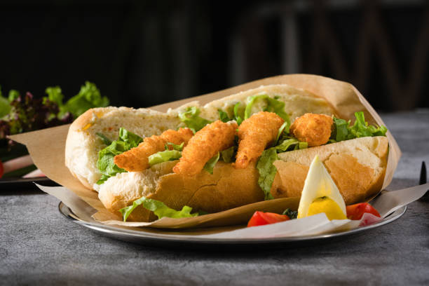 istock Deep fried shrimp in bread with greens on the side. Shrimp sandwich 2148948512