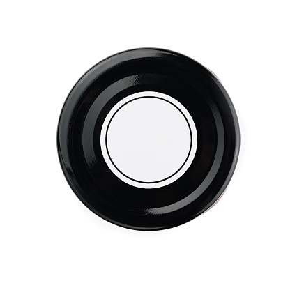 Top view of an empty black ceramic plate with a circular white center, isolated on white