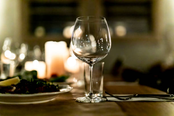 istock Pouring  redcwine at luxury restaurant and luxuryy tabel settings 2148950740