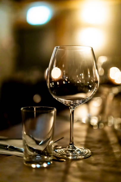 istock Pouring  redcwine at luxury restaurant and luxuryy tabel settings 2148950742