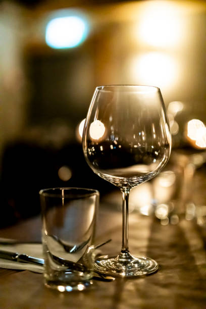istock Pouring  redcwine at luxury restaurant and luxuryy tabel settings 2148950746