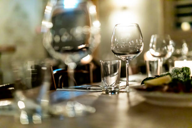 istock Pouring  redcwine at luxury restaurant and luxuryy tabel settings 2148950749