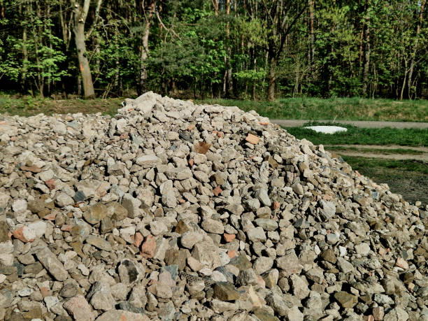 istock The use of recycled building materials on construction sites is an ecological solution to replace the extraction of minerals. recycled can be used as a surface of a field park road, road surface, back 2148951558