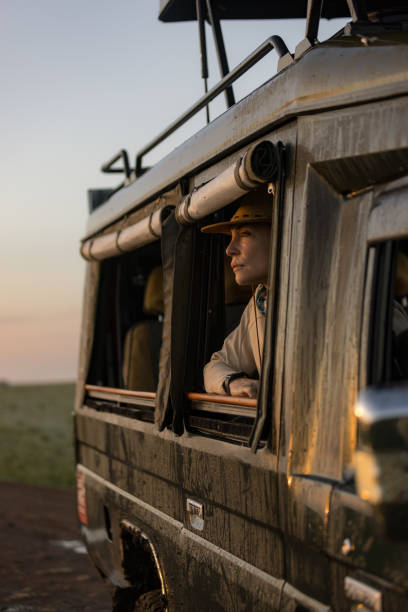 istock Pensive female explorer during game drive in wilderness. 2148957788