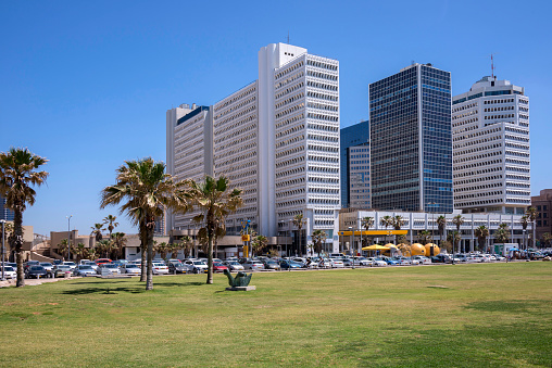 Tel Aviv, Israel - April 30, 2015: Charles Clore Park and modern buildings on the city waterfront