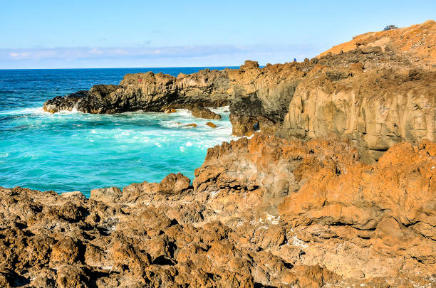 istock A rocky shoreline with a blue ocean in the background 2148960258