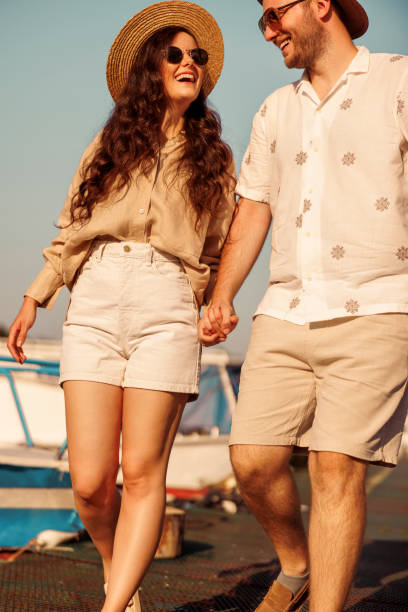 istock Couple taking a walk by the river 2148960846