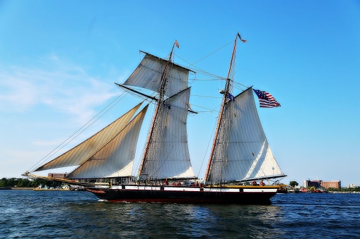 A beautiful large wooden sailboat in Boston Harbor