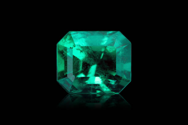 istock natural green emerald sapphire precious gemstone isolated on black background 2148965519