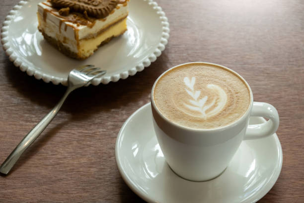 istock Cappuccino or latte with frothy foam and cake 2148965557