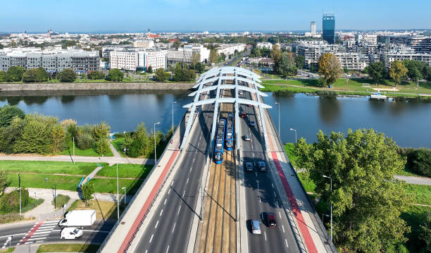 istock Kotlarski Bridge with two trams in Krakow, Poland 2148966376