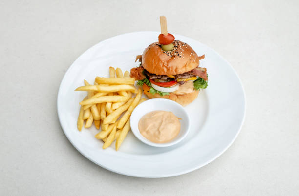 istock cheeseburger, and french fries 2148968226