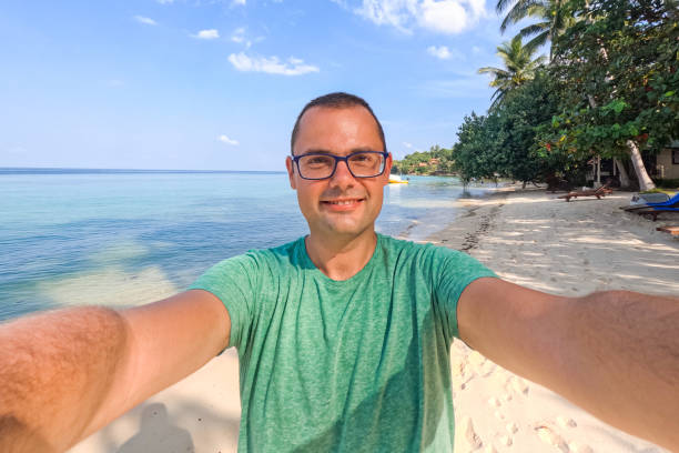 istock Young Man Taking Selfies On The Ko Phangan Beach In Thailand 2148968284