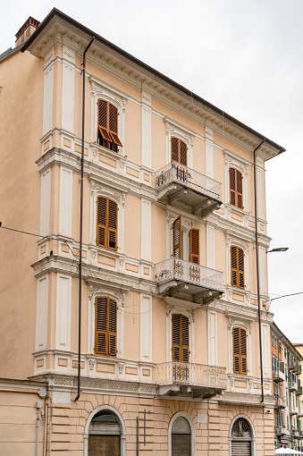Historic ornamented house facade seen in La Spezia, a city in the southern part of the Liguria region in Italy