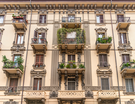 Historic ornamented house facade seen in La Spezia, a city in the southern part of the Liguria region in Italy