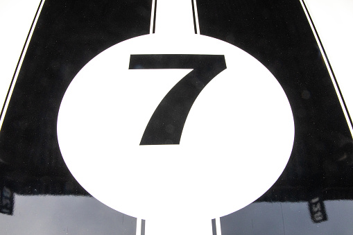 Number 7 on the bonnet of a car.