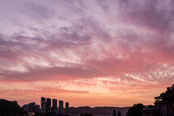 Dramatic golden sunset clouds sky over the South Korea countryside