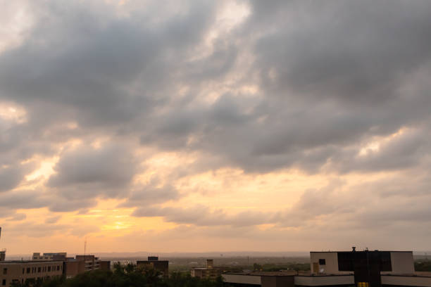 istock Dramatic colorful sunset clouds and sky in San Antonio Texas 2148969993