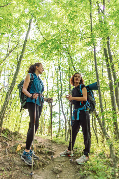 istock Two women taking a break from hiking 2148970061