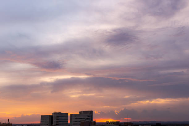 istock Dramatic colorful sunset clouds and sky in San Antonio Texas 2148970065