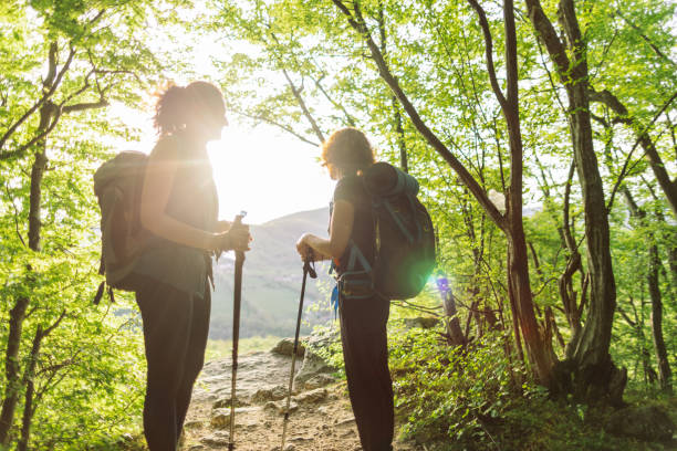 istock Two women taking a break from hiking to admire the view 2148970172