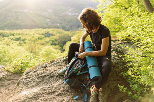 istock Woman taking a break from hiking to admire the view 2148970194