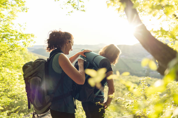 istock Two women taking a break from hiking to admire the view 2148970206