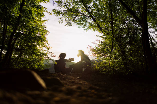 istock Two women taking a break from hiking to admire the view 2148970303